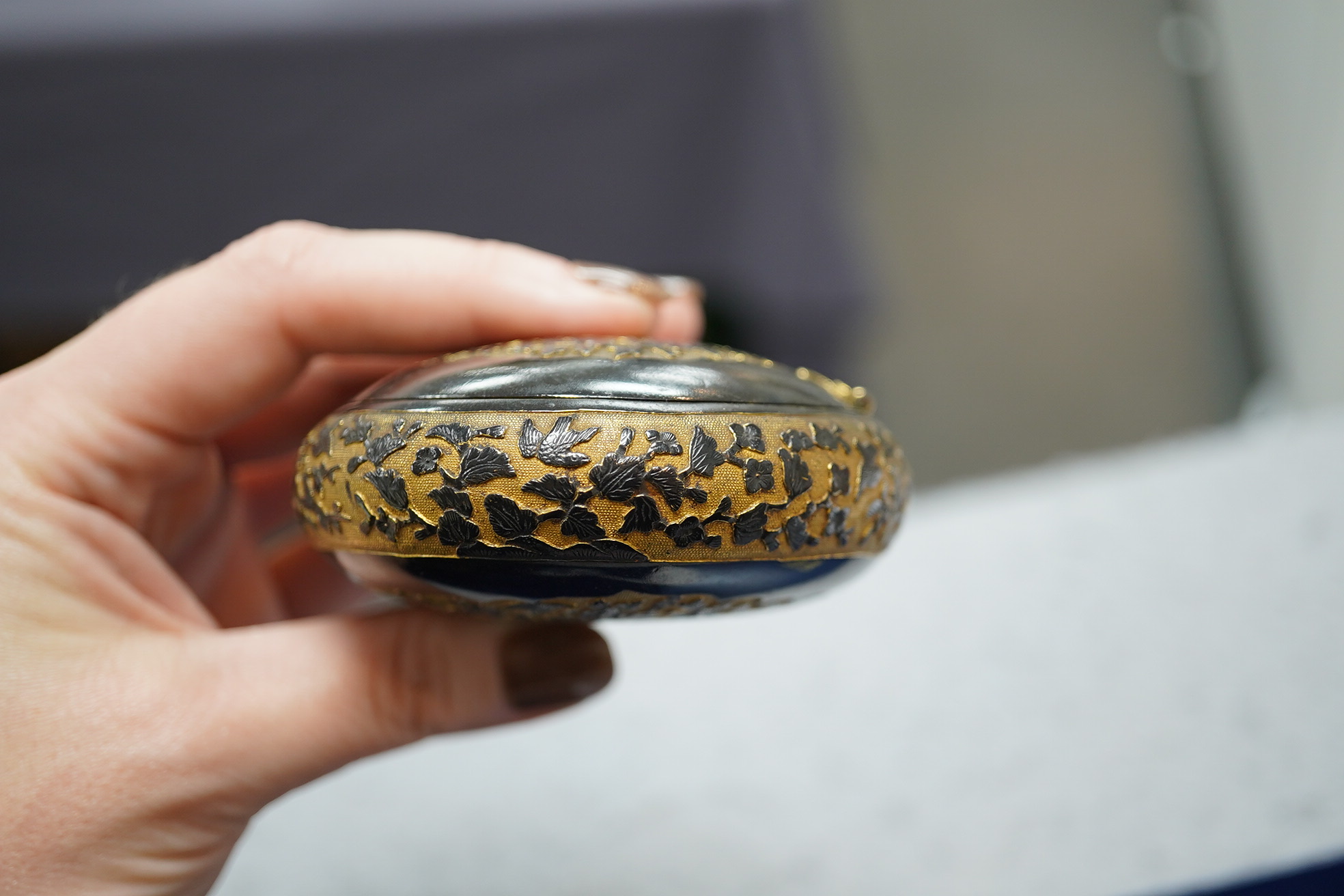 A Japanese export gilt bronze Sawasa oval tobacco box, 18th century